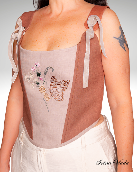 Corsetto in lino con ricamo floreale